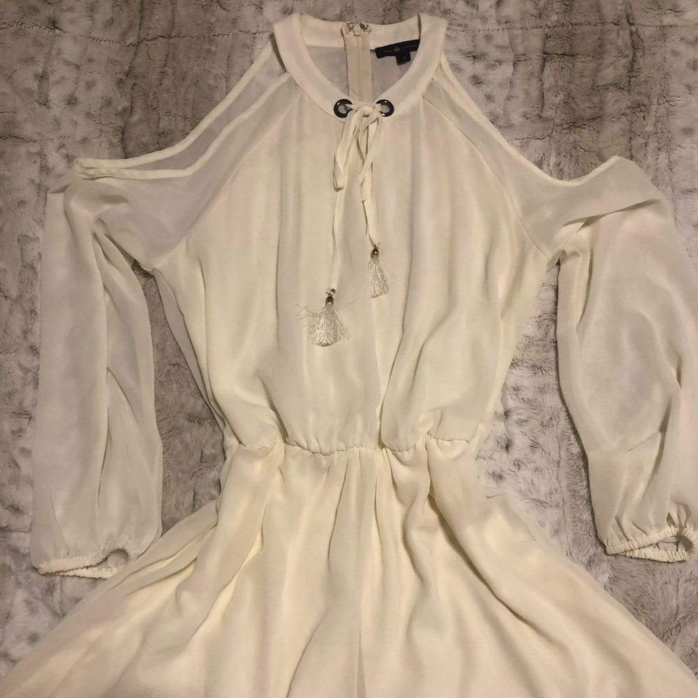 Cream colored long sleeved romper!
